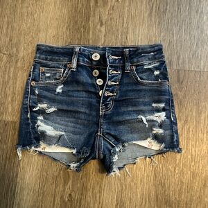 ripped dark wash jean shorts